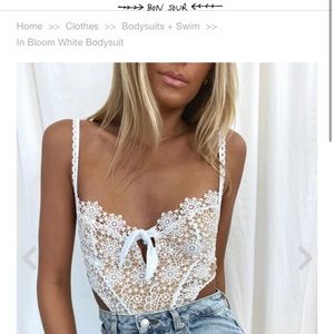 Amazing floral lace bodysuit from Isabelle's cabinet, worn once in this photo!